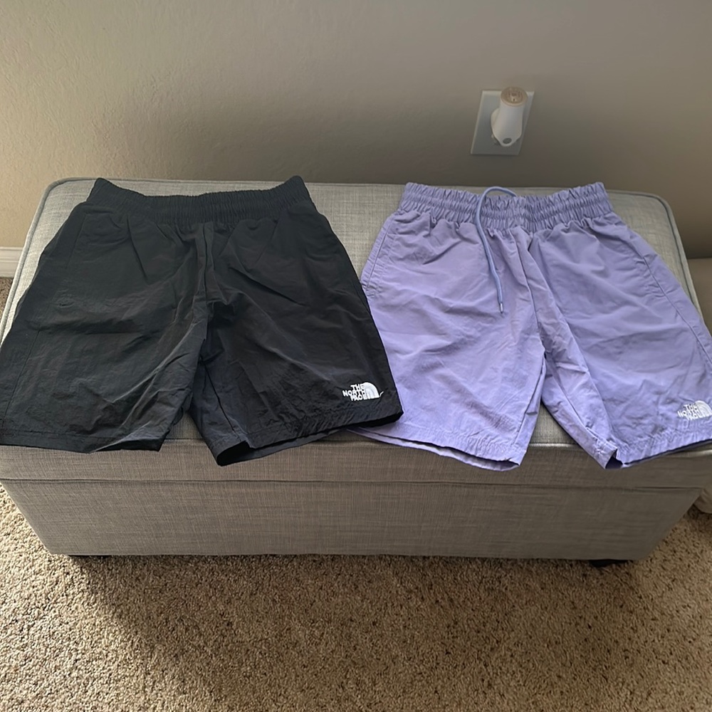 North Face Shorts (2) one Black and one Light Purple Never Worn